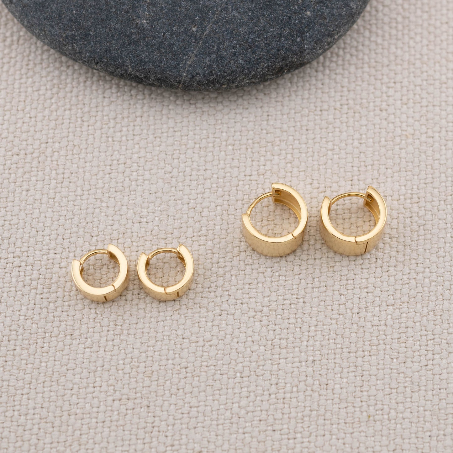 Minimalistic thick small huggie hoop