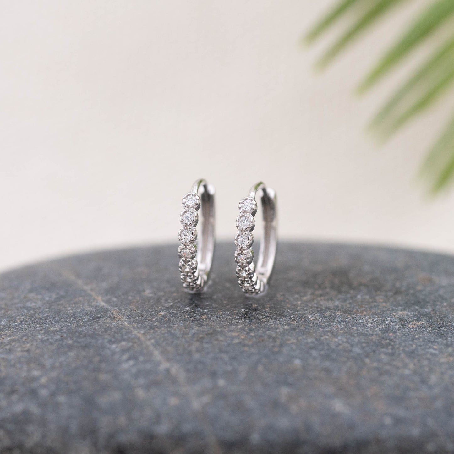 Gold huggy tiny diamond pave huggie hoop