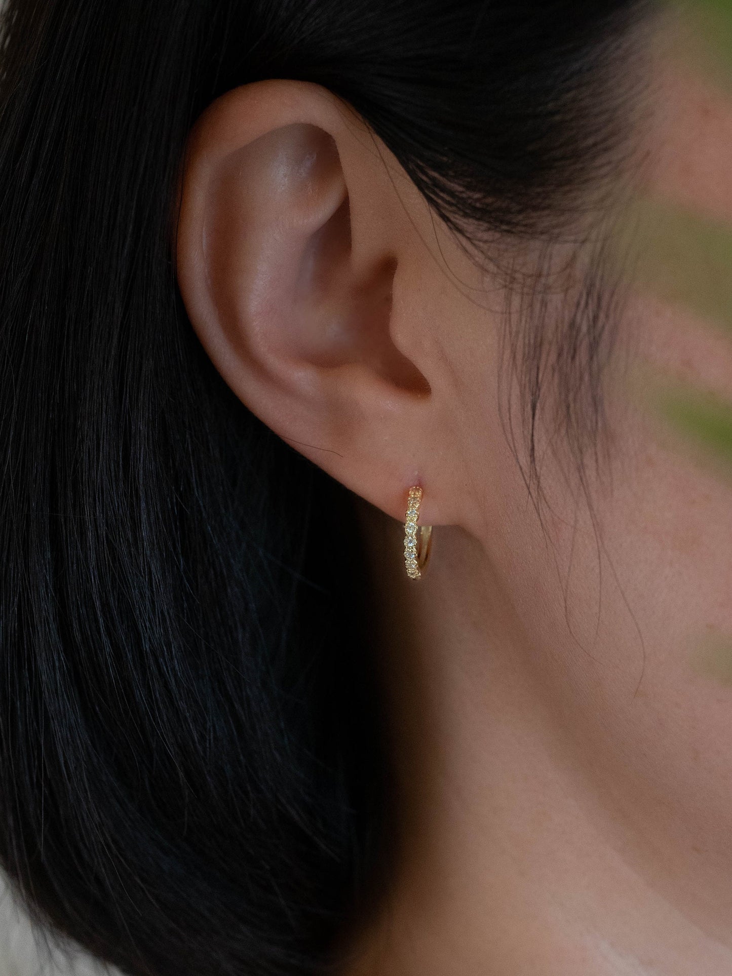 Gold huggy tiny diamond pave huggie hoop