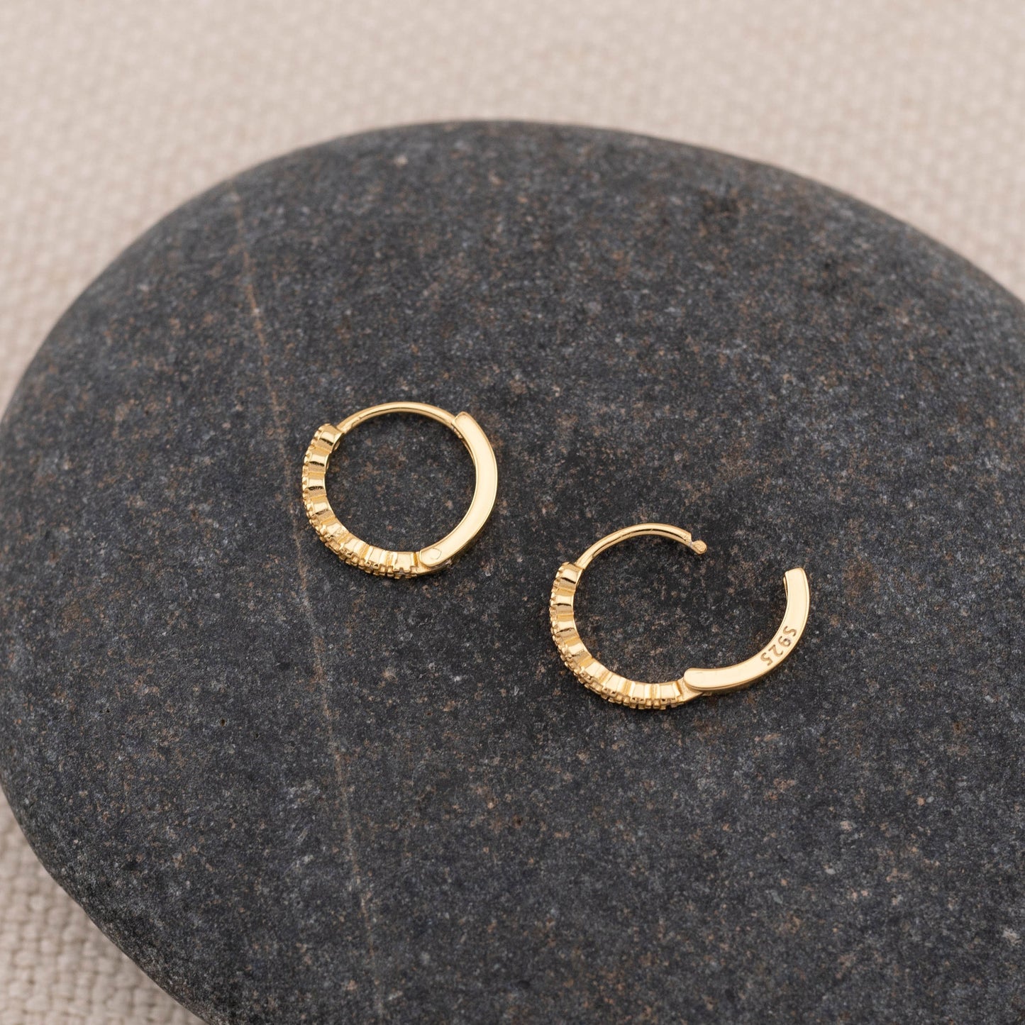 Gold huggy tiny diamond pave huggie hoop