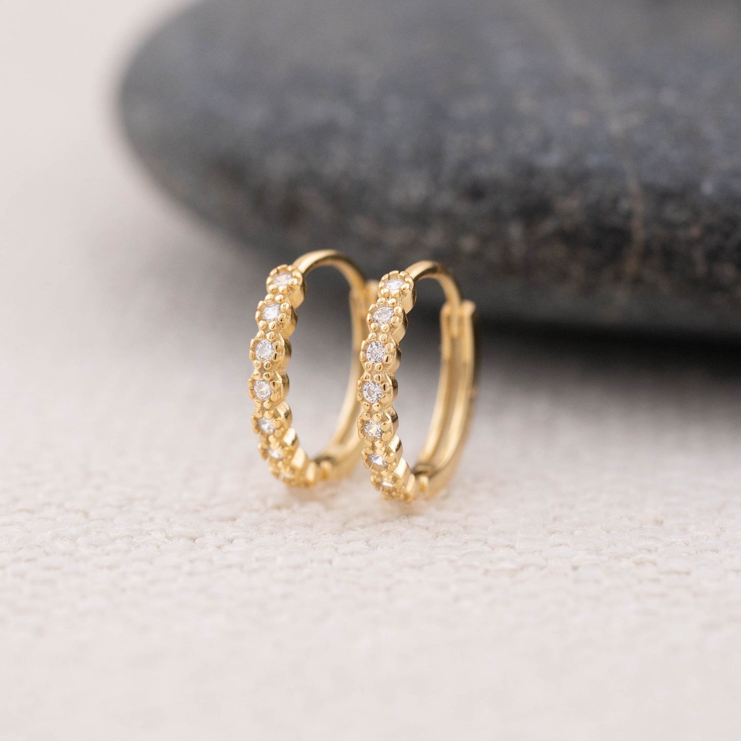 Gold huggy tiny diamond pave huggie hoop