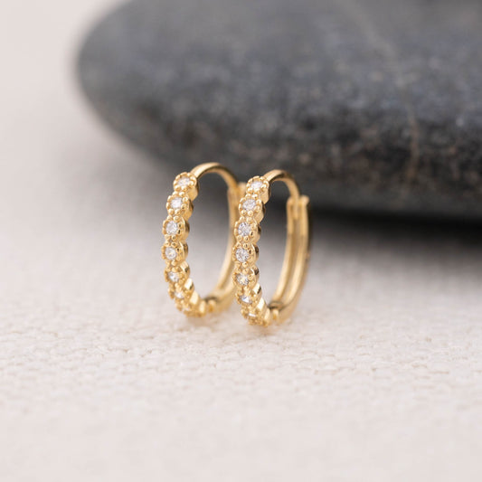 Gold huggy tiny diamond pave huggie hoop