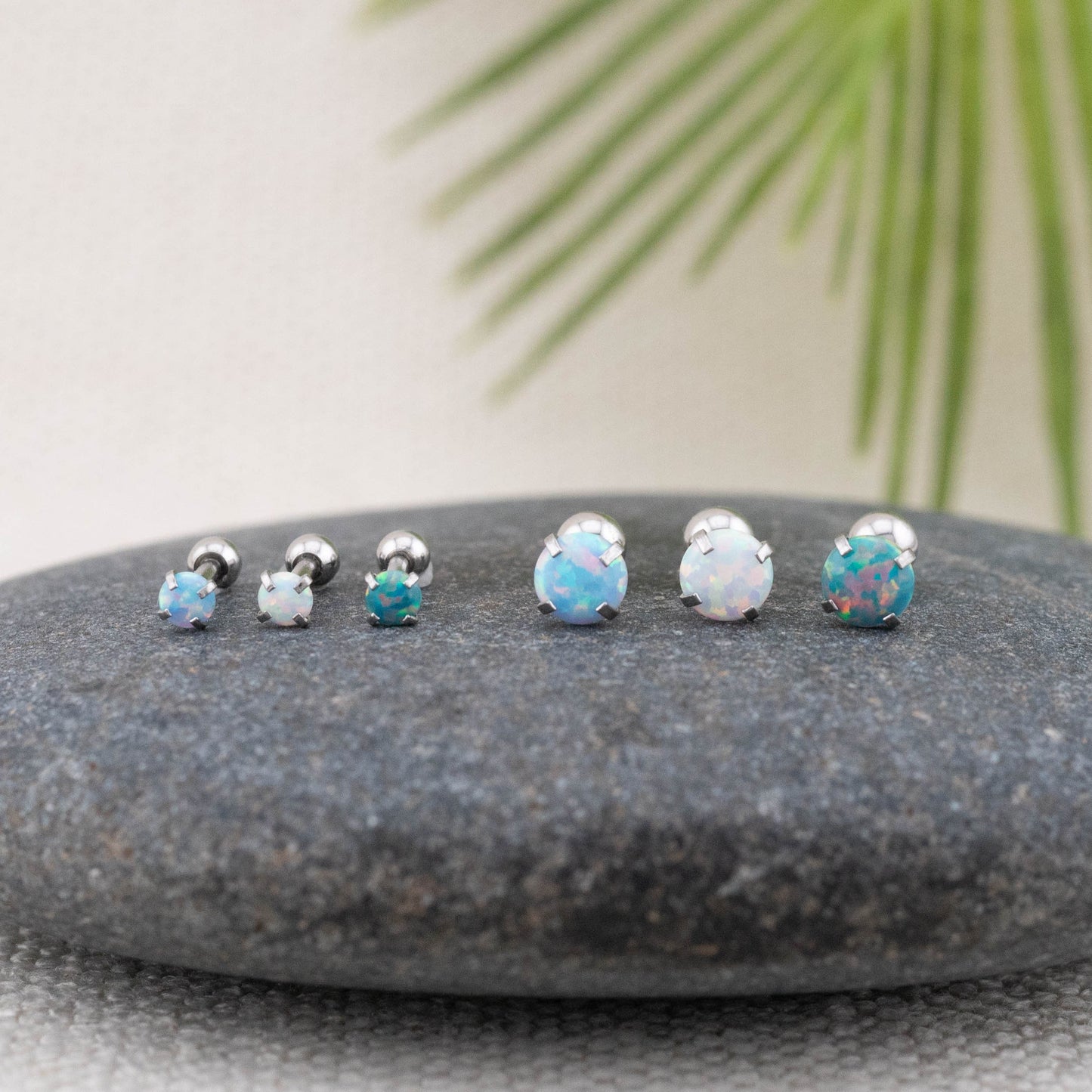 Small fire opal screw back titanium piercing