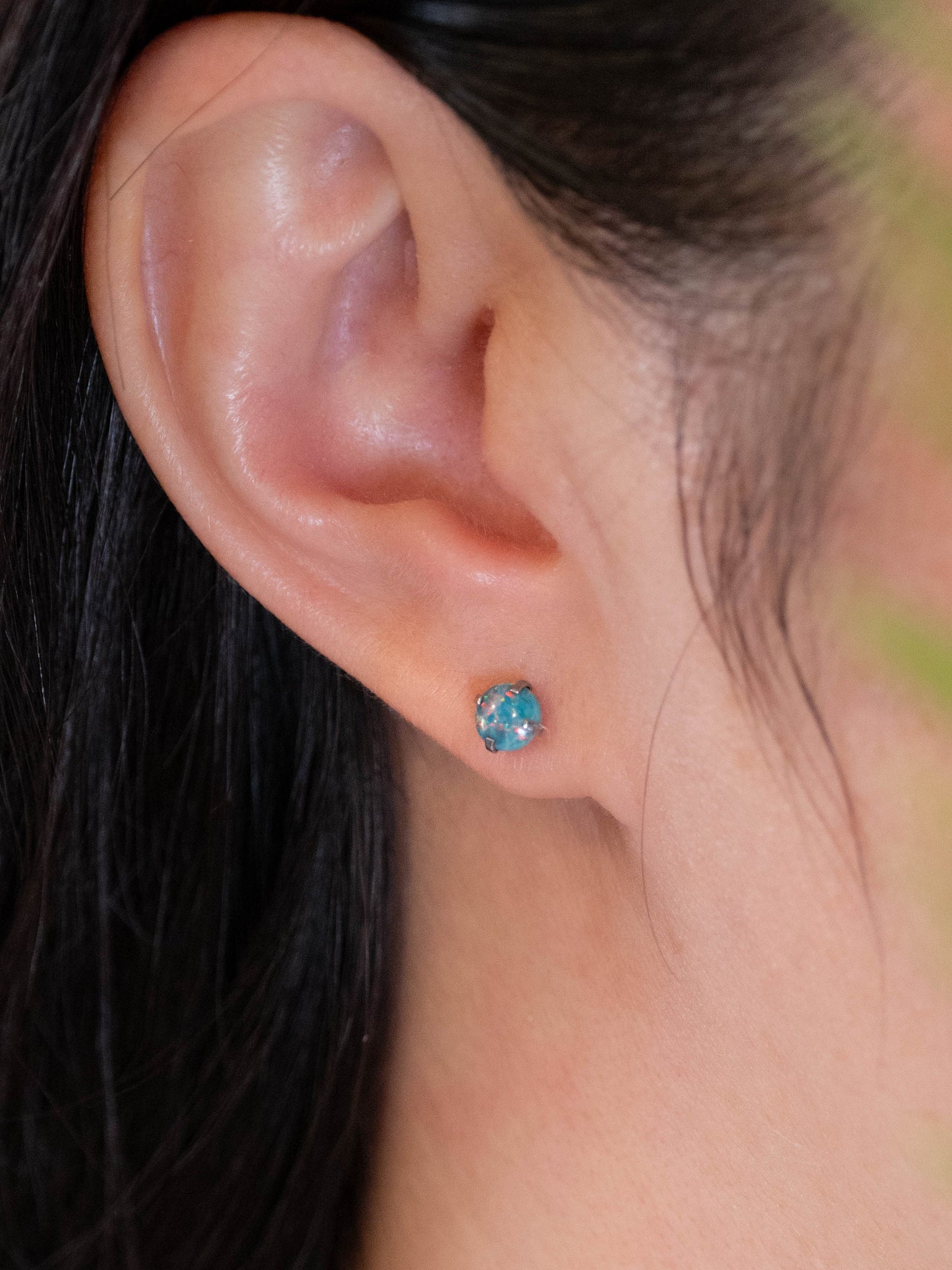 Small fire opal screw back titanium piercing