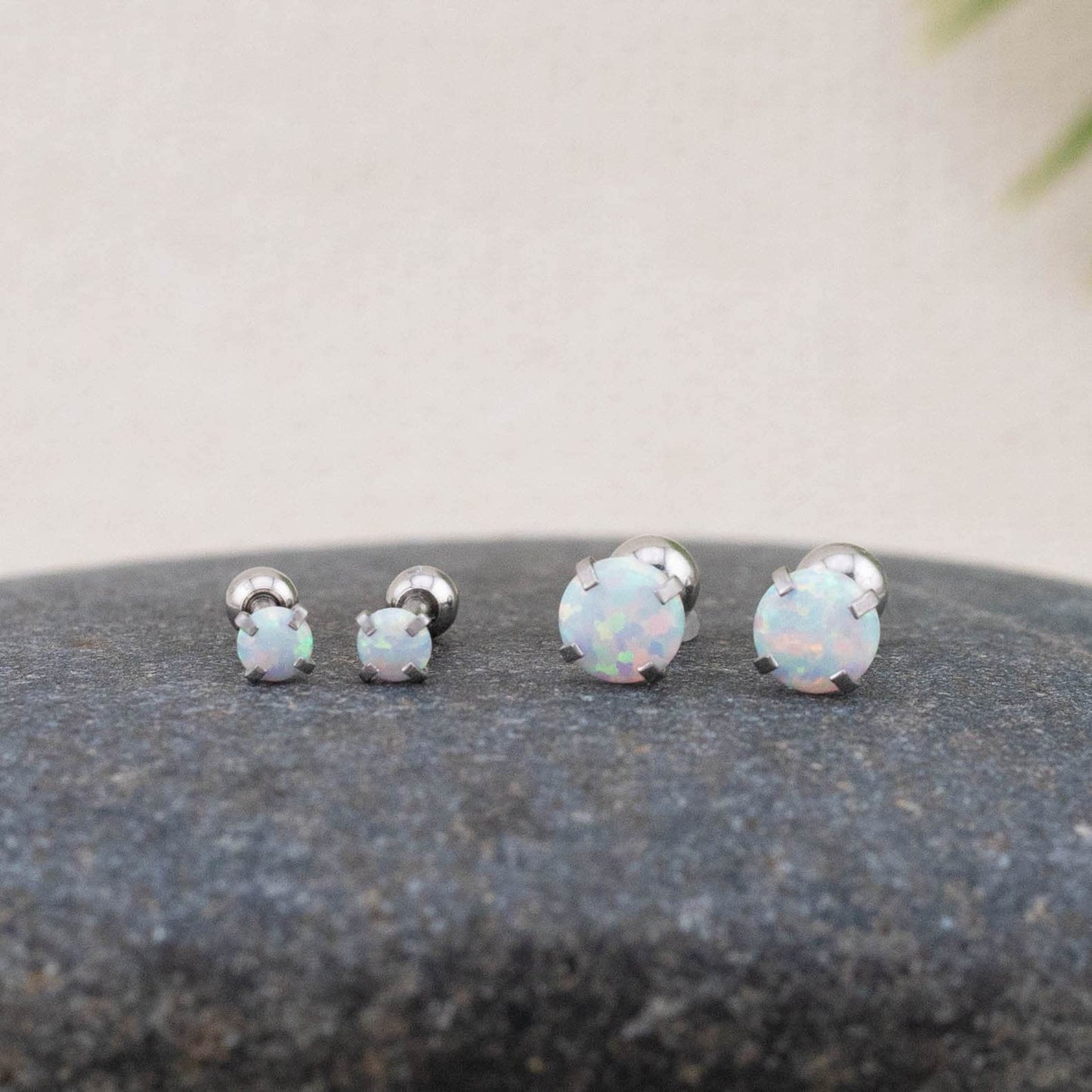 Small fire opal screw back titanium piercing