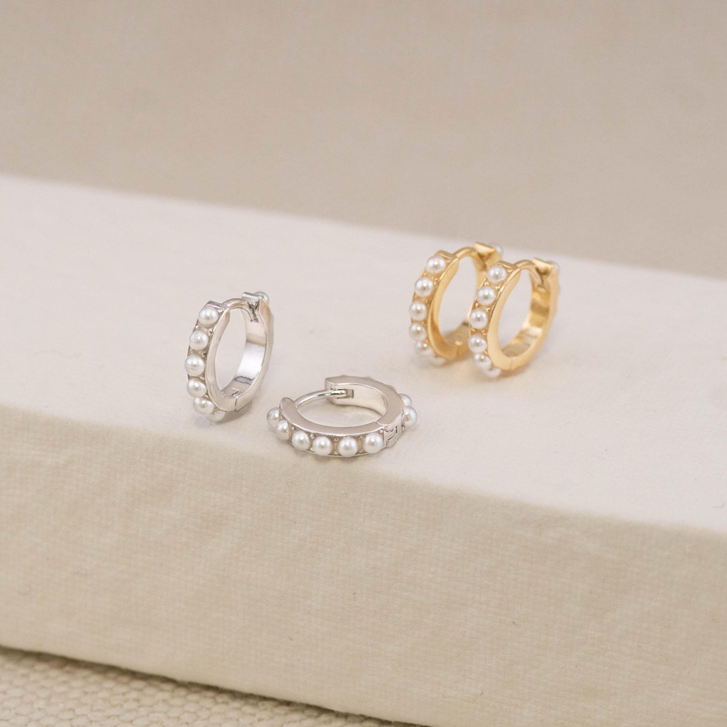 Pearl huggie earrings