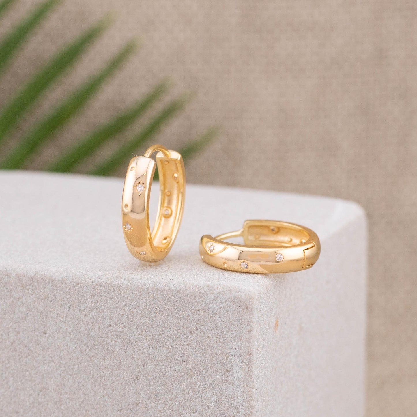 Gold celestial hoop huggies