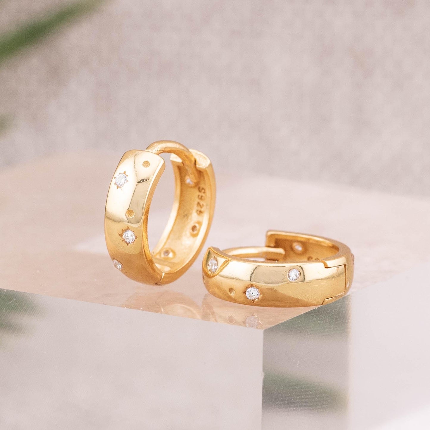 Gold celestial hoop huggies