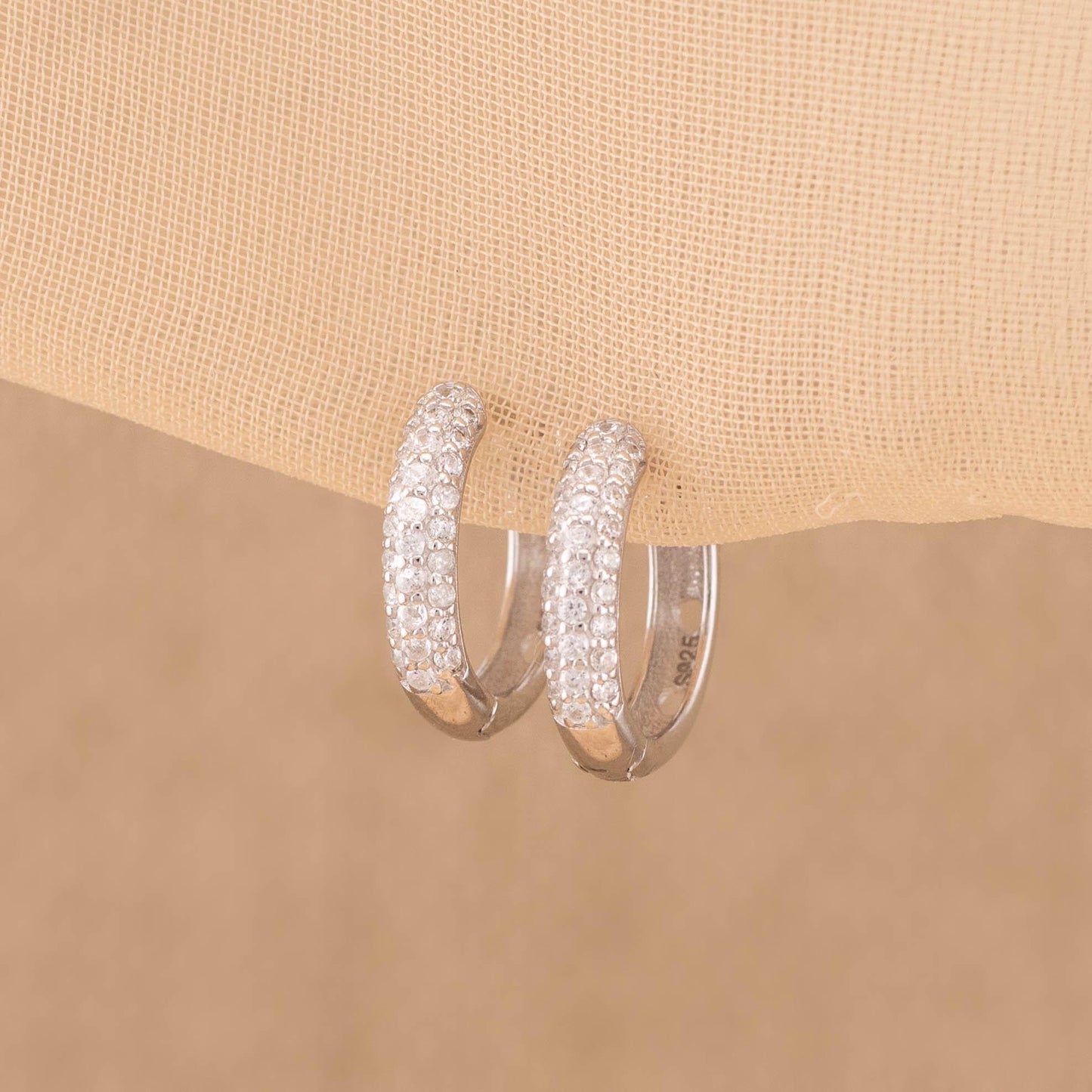 Thick pave small huggie hoops