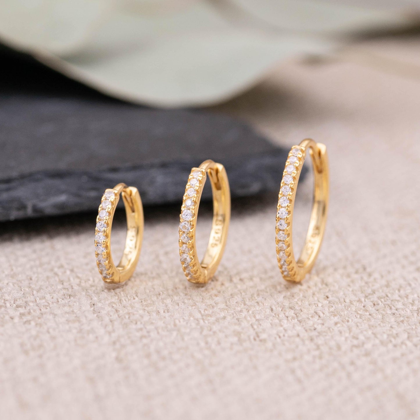 Gold pave huggie hoop earrings