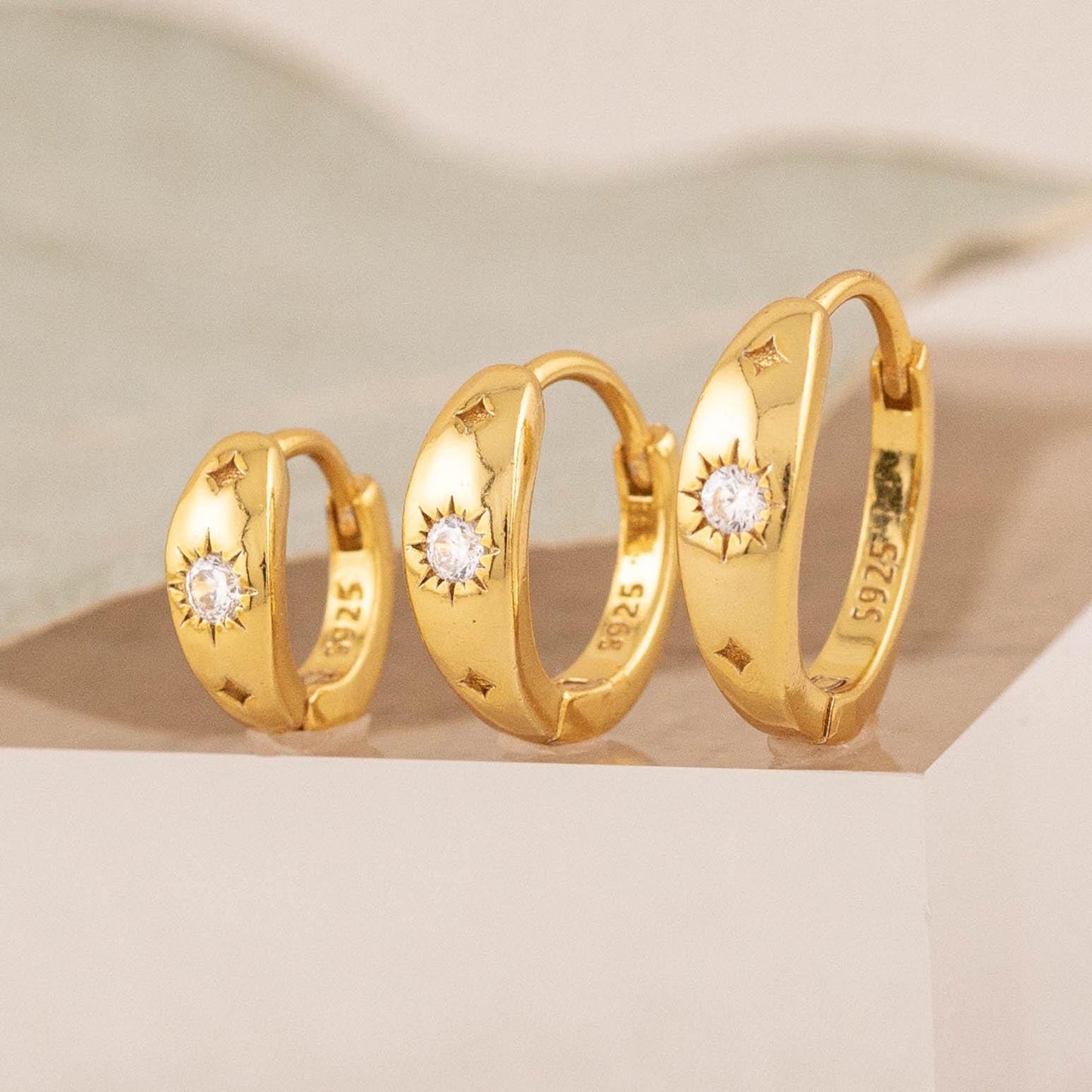 Celestial tapered huggie hoop