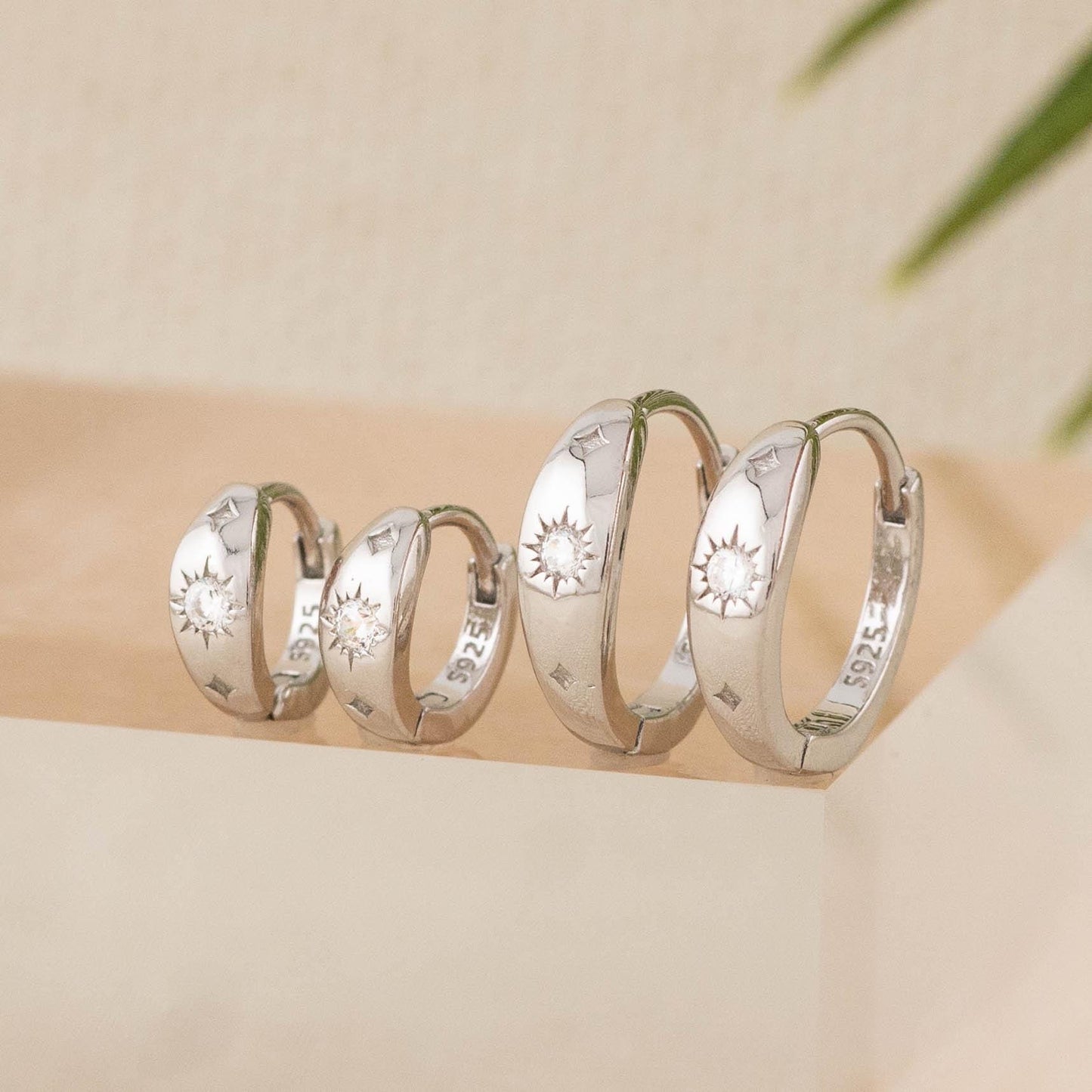 Celestial tapered huggie hoop