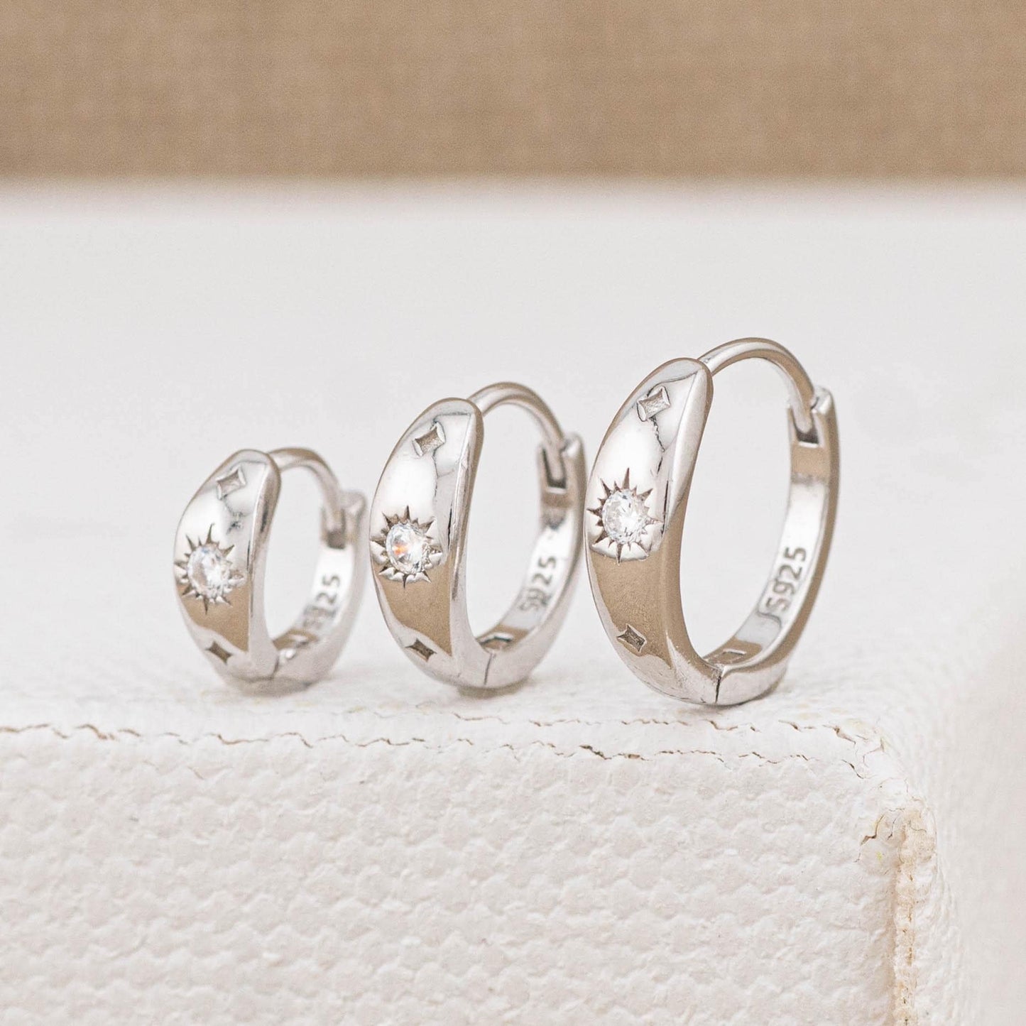 Celestial tapered huggie hoop