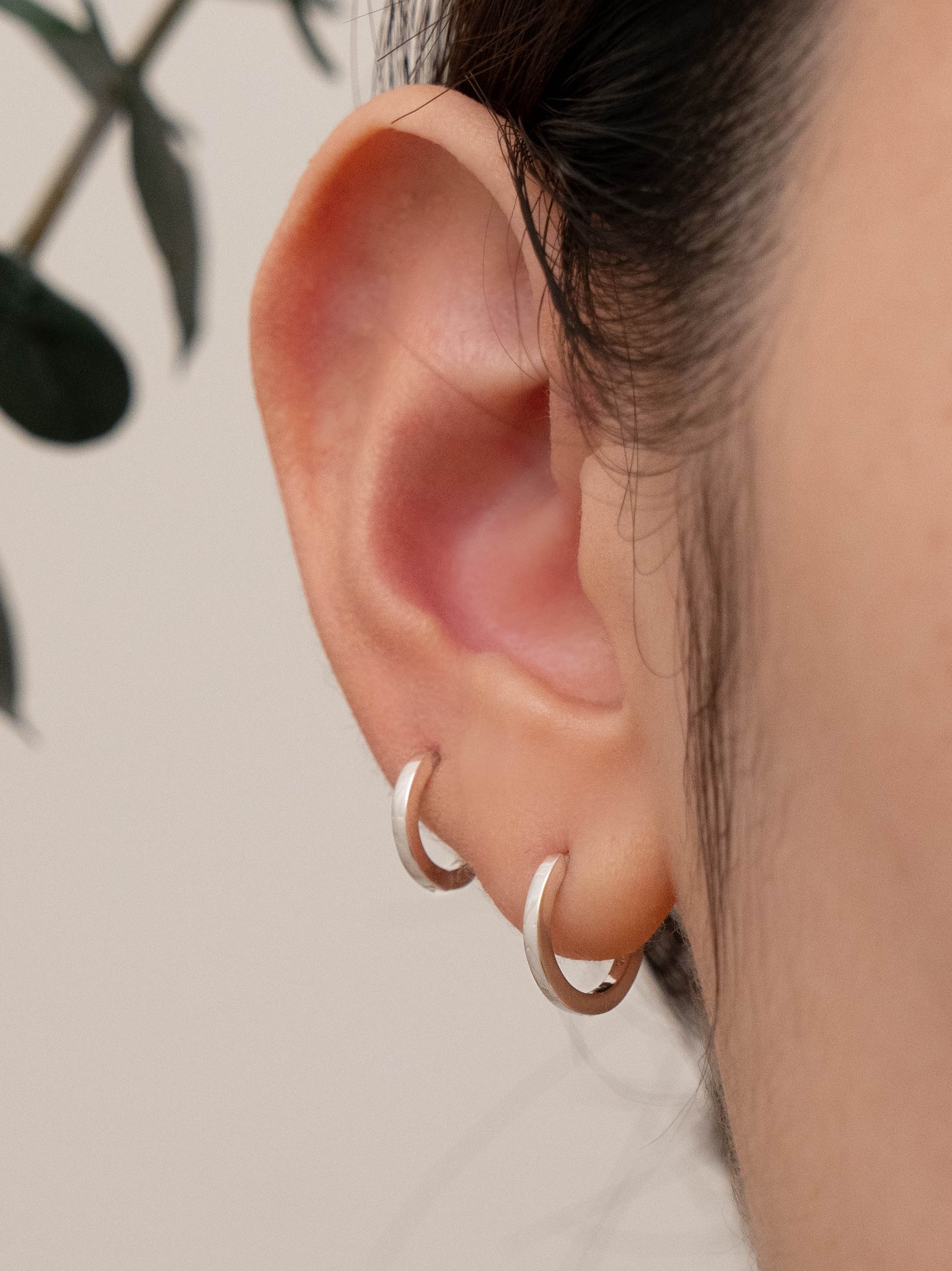 Stackable earring sets for 2 holes on ear model, showing comfortable fit for everyday wear.